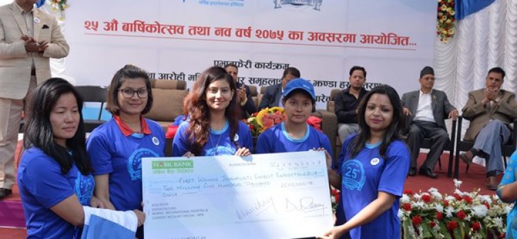 Handed over a cheque of Rs 2.5 million to a group of five women journalists attempting to climb Mt. Everest